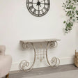 Distressed White Metal Side Table With Curled Legs