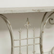 Distressed White Metal Side Table With Curled Legs