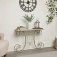 Distressed White Metal Side Table With Curled Legs