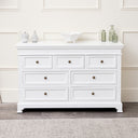 This Large White 7 Drawer Chest of Drawers &amp; Pair of Wide Bedside Tables from the Daventry White Range is a classic, stylish furniture set, ideal for those with neutral interiors. Made of wood and metal, this set includes a large 7 drawer chest of drawers