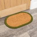 Natural Oval Coir Door Mat with a Green Border